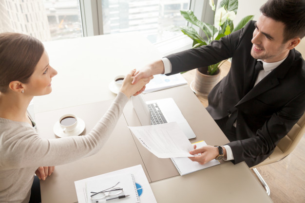 business-partners-celebrating-contract-signing_1163-5347-1